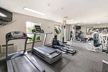 fitness center at New Fountains Apartments